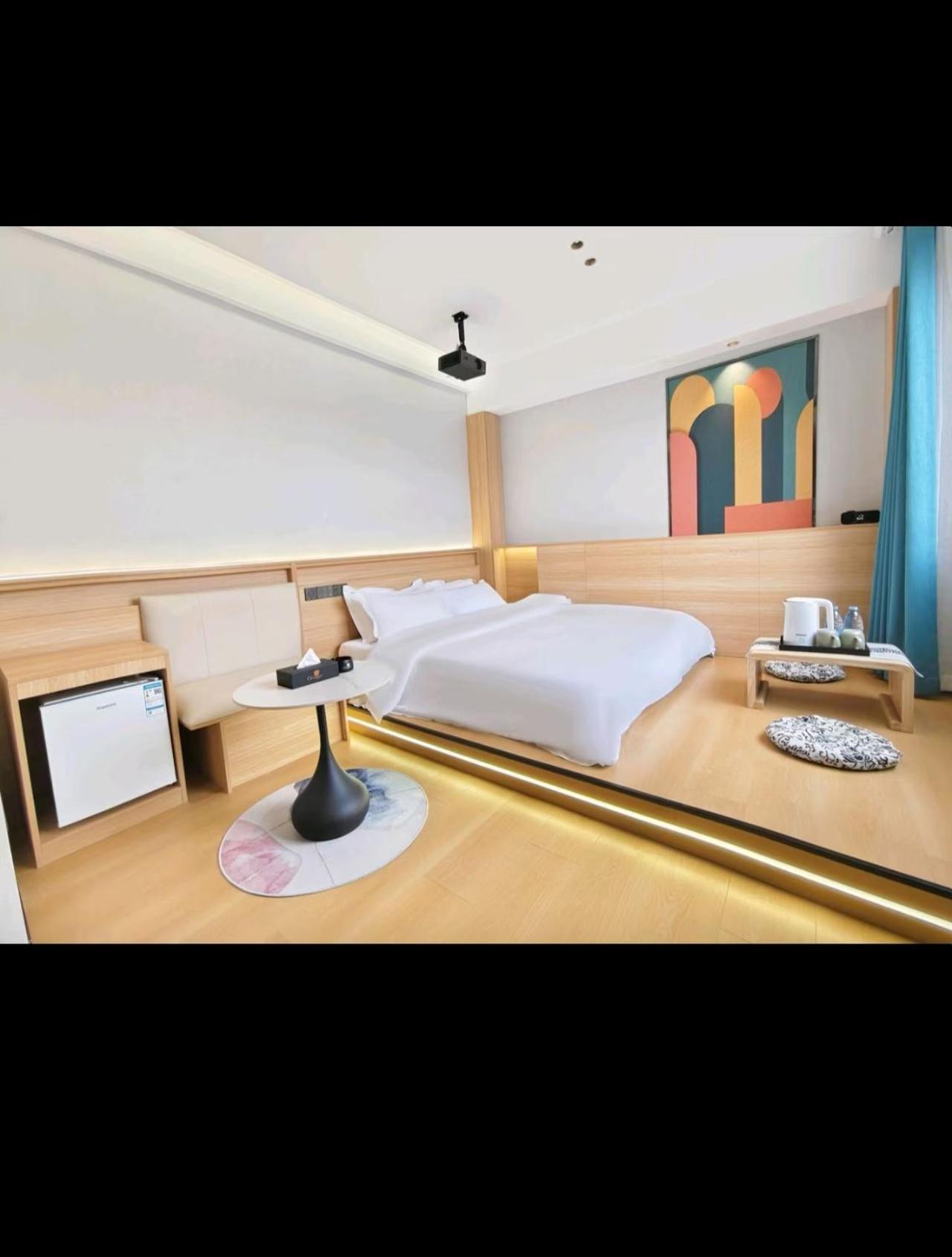 Orange Huaju Hotel Mianyang Exterior foto